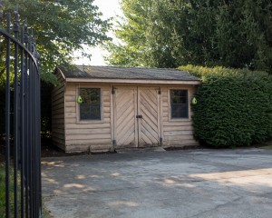 Backyard shed for storing pool chemicals.