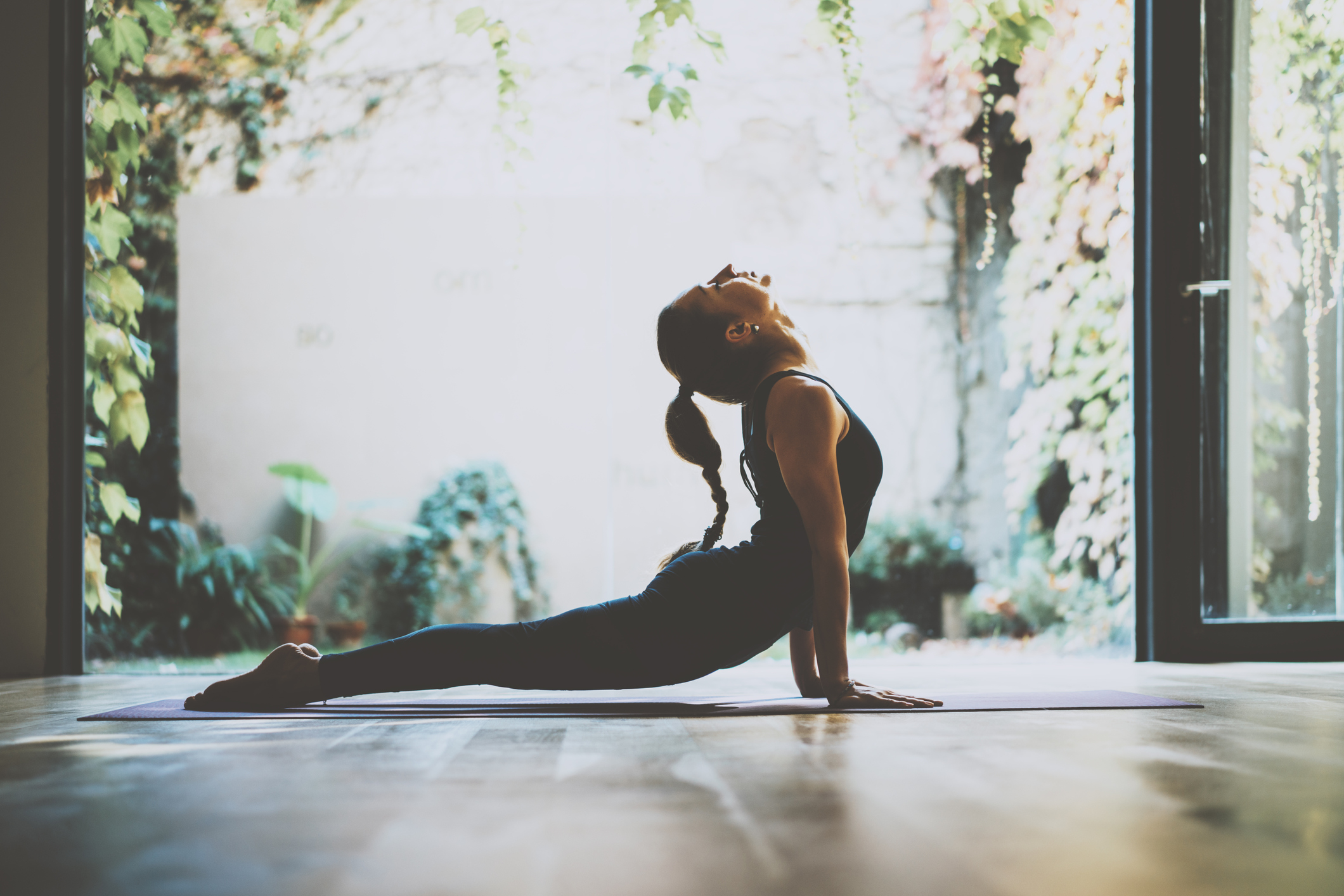 Young woman practicing yoga.