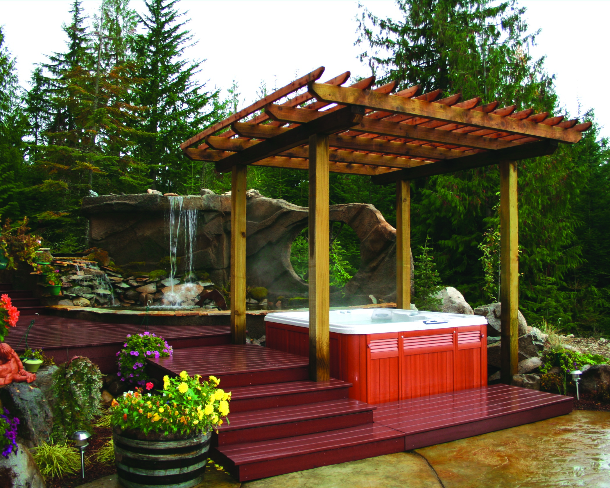 Beautiful outdoor living space with a hot tub. Beautiful outdoor living space with a hot tub.