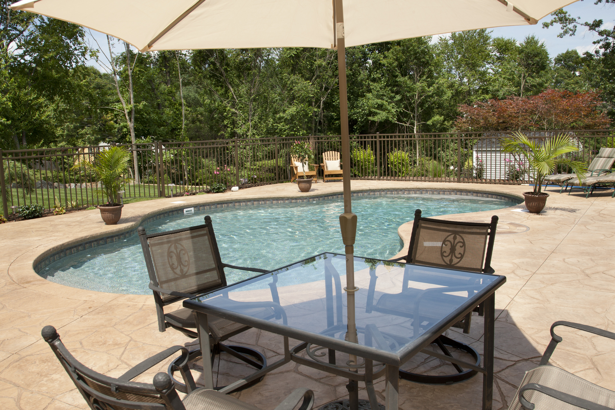 Swimming pool patio area in the spring.