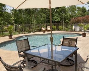 Swimming pool patio area in the spring.